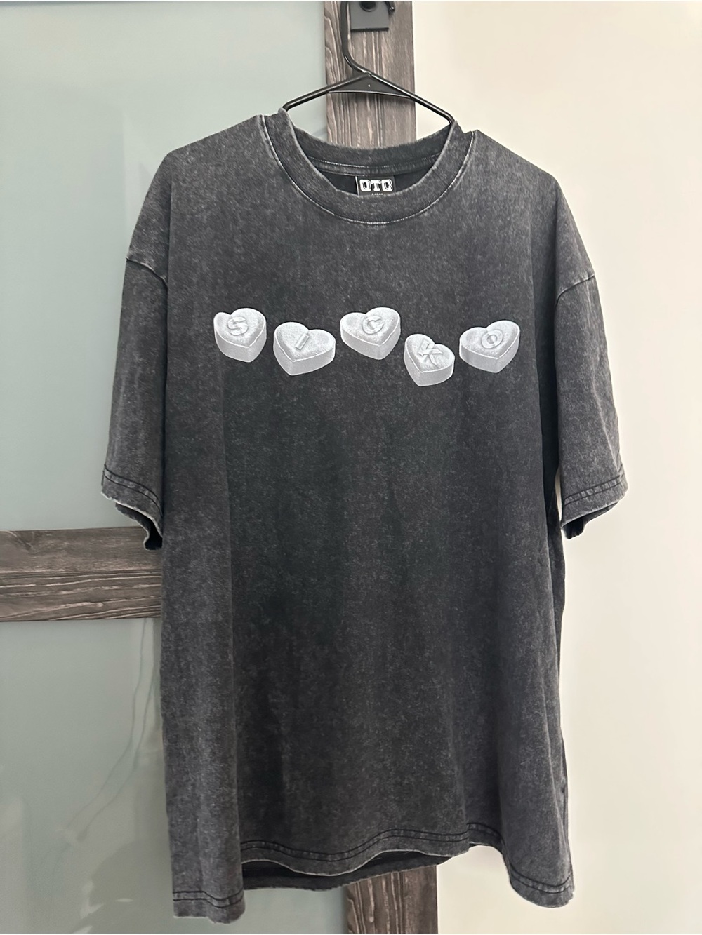 OTC Black Short-Sleeve Tee with White Heart Candy Motif